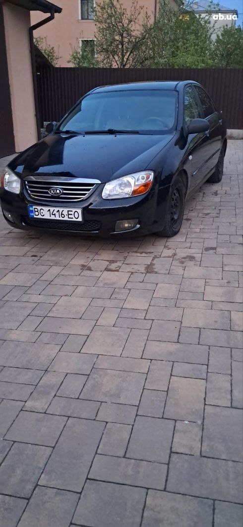 Kia Cerato 2007 черный - фото 8