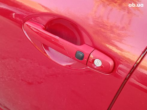 Toyota Auris 2007 красный - фото 17