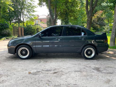 Mitsubishi Lancer 2003 черный - фото 12