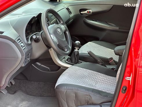 Toyota Corolla 2009 красный - фото 10