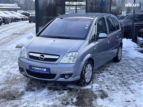 Opel Meriva 2009 - фото 7