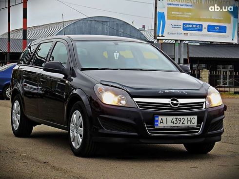 Opel Astra 2011 - фото 2