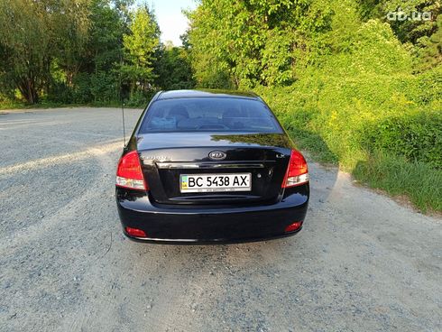 Kia Cerato 2007 черный - фото 4