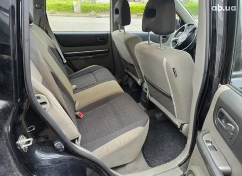 Nissan Navara 2006 черный - фото 5