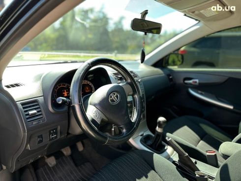 Toyota Corolla 2008 черный - фото 5