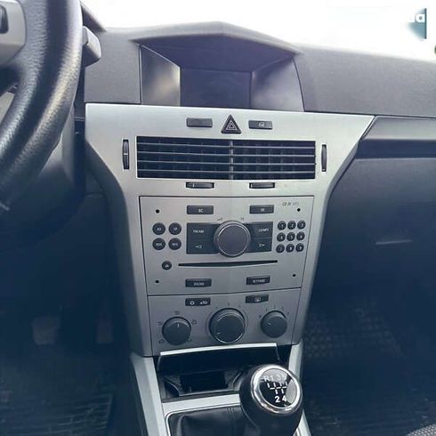 Opel Astra 2009 - фото 11