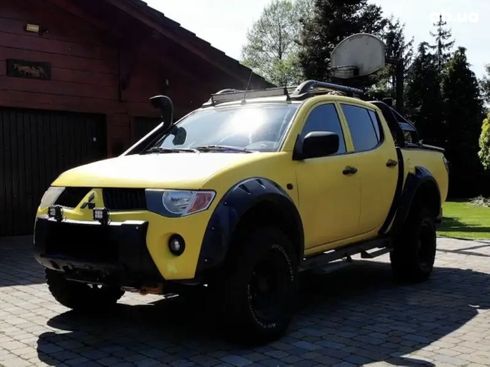 Mitsubishi L200 2008 желтый - фото 2