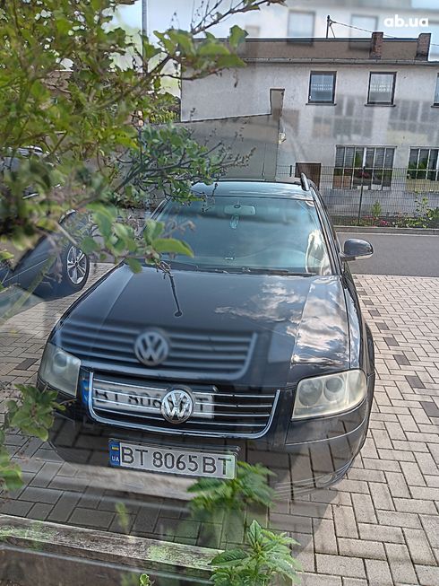 Volkswagen Passat 2004 черный - фото 15