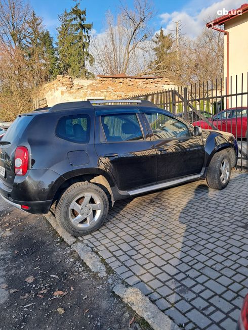 Dacia Duster 2011 черный - фото 4