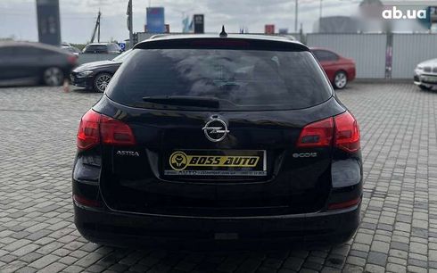 Opel Astra 2011 - фото 6
