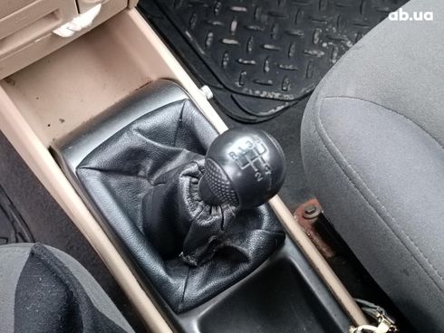 Chevrolet Aveo 2008 оранжевый - фото 34