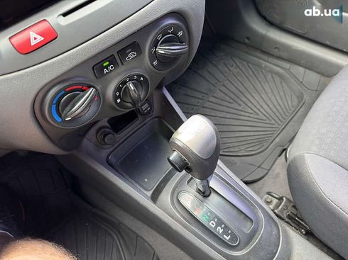 Kia Rio 2007 - фото 19