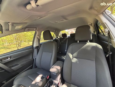 Toyota Corolla 2016 черный - фото 24