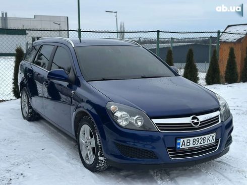 Opel Astra 2010 - фото 8