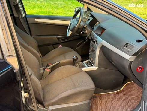 Opel Astra 2009 черный - фото 25