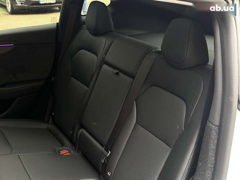 Tesla Model Y 2025 - фото 14