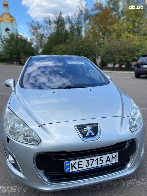 Peugeot 308 2011 серебристый - фото 13