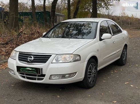 Nissan Almera 2011 - фото 7