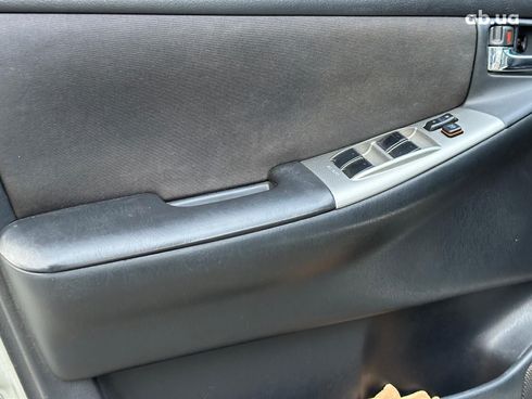 Toyota Corolla 2006 серый - фото 9