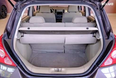 Nissan Tiida 2009 фиолетовый - фото 9