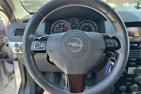 Opel Astra 2010 - фото 14