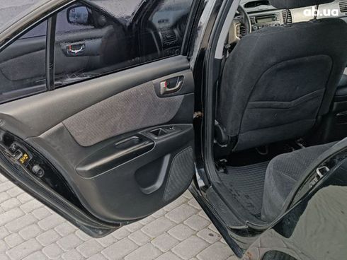 Kia Magentis 2006 черный - фото 22