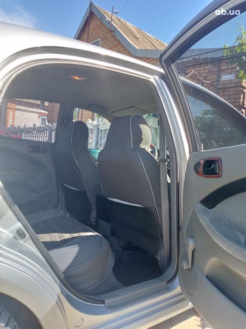 Chevrolet Lacetti 2006 серебристый - фото 8
