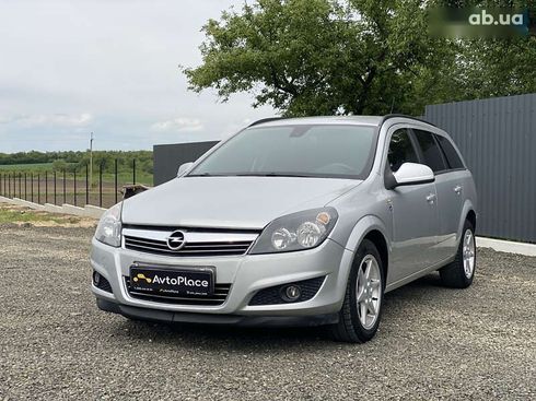 Opel Astra 2010 - фото 7