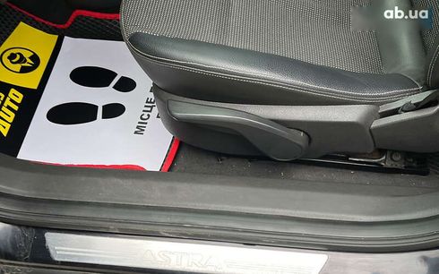 Opel Astra 2010 - фото 19