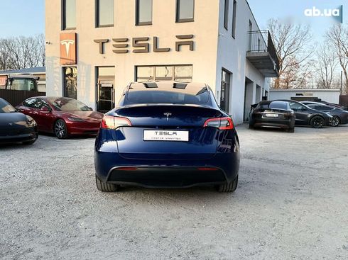 Tesla Model Y 2024 - фото 17