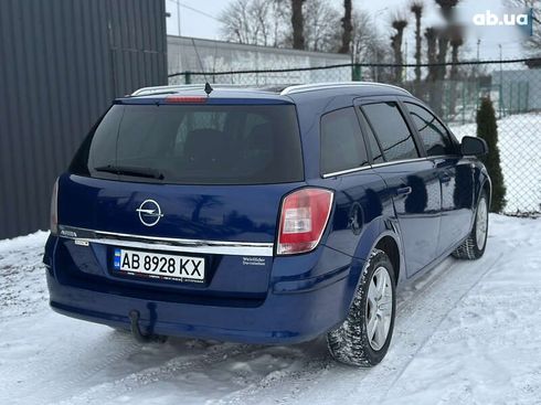 Opel Astra 2010 - фото 11