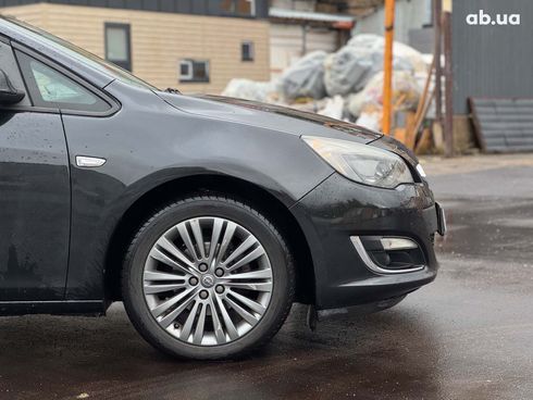 Opel Astra 2013 черный - фото 13