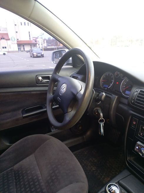 Volkswagen Passat 2003 серебристый - фото 9