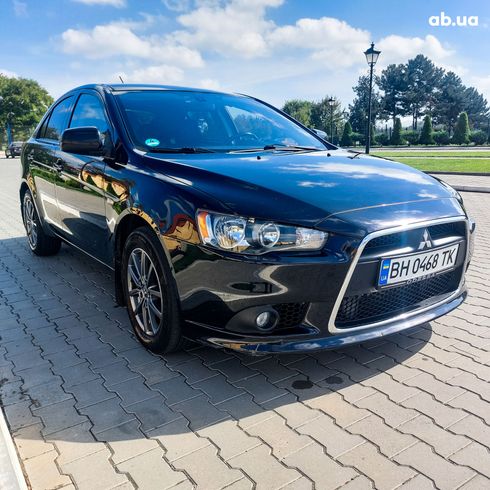 Mitsubishi Lancer 2010 черный - фото 19