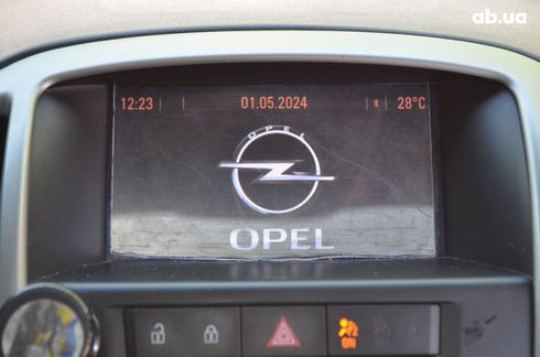 Opel Astra J Hatchback 2010 черный - фото 17