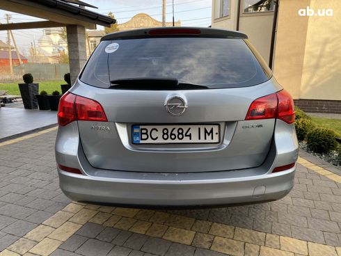 Opel Astra J 2011 серый - фото 4