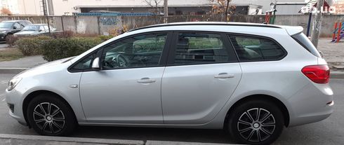Opel Astra J 2012 серебристый - фото 3