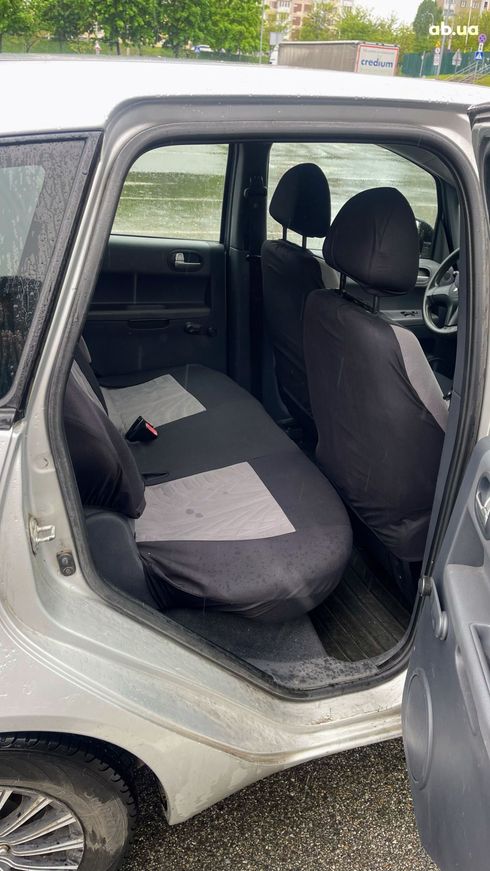 Mitsubishi Colt 2006 серебристый - фото 8
