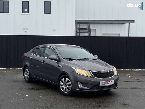 Kia Rio 2013 - фото 5