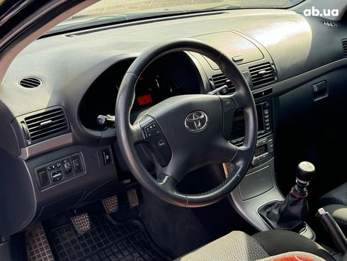 Toyota Avensis 2007 черный - фото 44