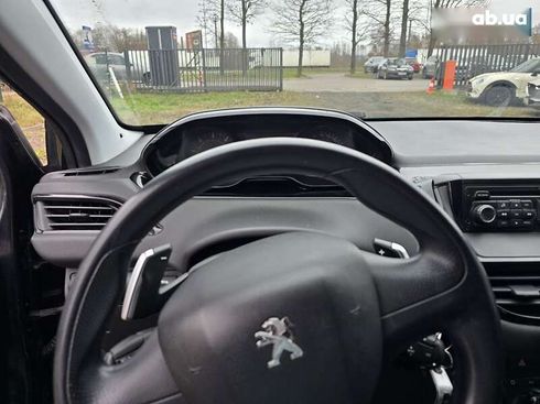 Peugeot 208 2012 - фото 12