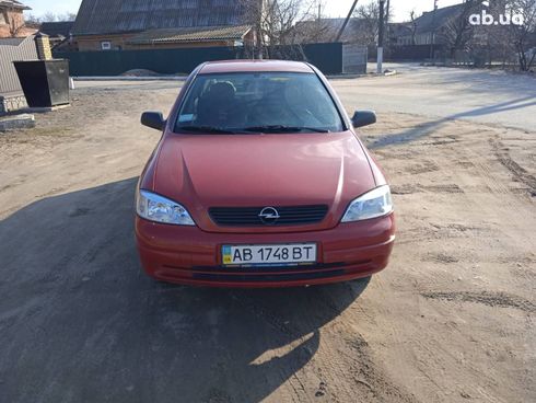 Opel Astra G 2008 красный - фото 10