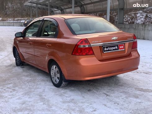 Chevrolet Aveo 2007 желтый - фото 7