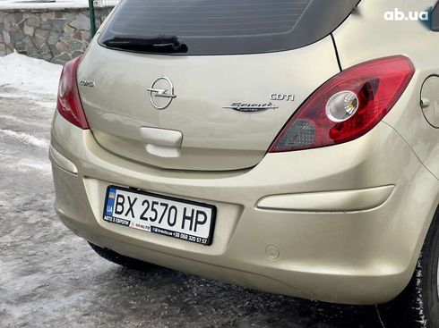 Opel Corsa 2008 - фото 26