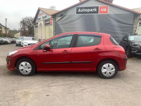 Peugeot 308 2010 красный - фото 8