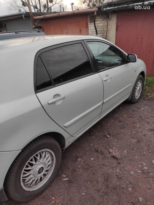 Toyota Corolla 2006 серебристый - фото 6