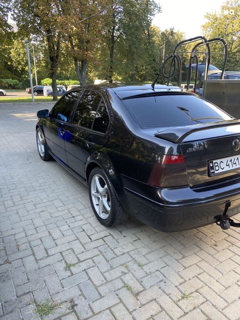 Volkswagen Bora 1999 черный - фото 5