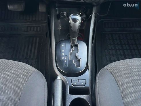 Kia Rio 2013 - фото 29