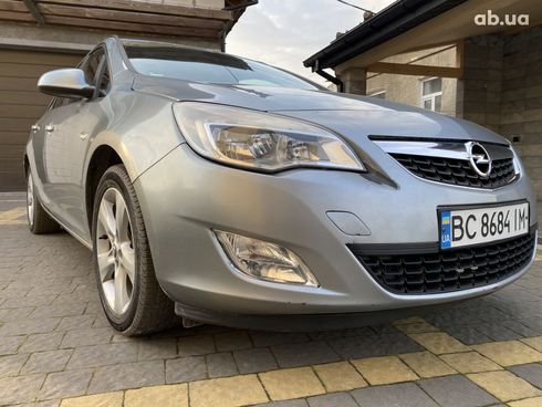 Opel Astra J 2011 серый - фото 18
