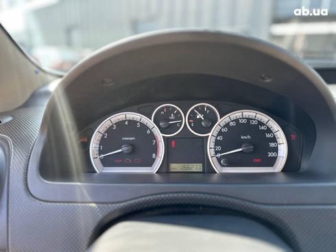 Chevrolet Aveo 2007 оранжевый - фото 19